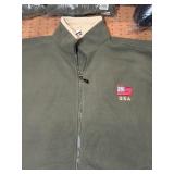 5 shelves of apparel: jackets, hoodies, sweatshirts