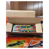 Crossbow and everything  on that shelf plus All Blow darts on floor