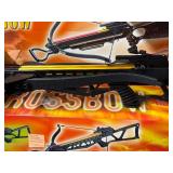 Crossbow and everything  on that shelf plus All Blow darts on floor