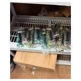 Crossbow and everything  on that shelf plus All Blow darts on floor