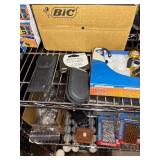 Key chains, Flashlights, rubber bands,  aluminum wallets, poker set in case, shot glasses