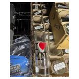 Key chains, Flashlights, rubber bands,  aluminum wallets, poker set in case, shot glasses