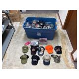Tub (included) of hats, vinyl decals, lip balm holders