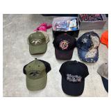 Tub (included) of hats, vinyl decals, lip balm holders