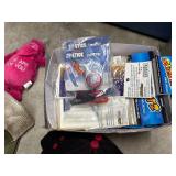 Tub (included) of hats, vinyl decals, lip balm holders