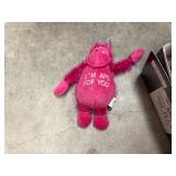 Tub (included) of hats, vinyl decals, lip balm holders