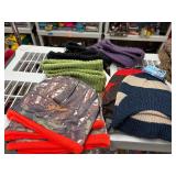 Shirts, sweatshirts, shot glasses, blankets, wallets, winter hats, incense, decals, flash lights, bracelets