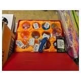 Shirts, sweatshirts, shot glasses, blankets, wallets, winter hats, incense, decals, flash lights, bracelets