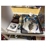 Shirts, sweatshirts, shot glasses, blankets, wallets, winter hats, incense, decals, flash lights, bracelets