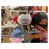 Winter hats, baseball caps and flags (top shelf)