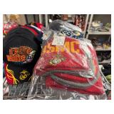 Winter hats, baseball caps and flags (top shelf)