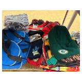 Winter hats, baseball caps and flags (top shelf)