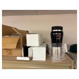 NASCAR lighters, cars, shirts, can coolers, blankets, flasks, desk set, hats, and license plates