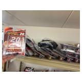 NASCAR lighters, cars, shirts, can coolers, blankets, flasks, desk set, hats, and license plates
