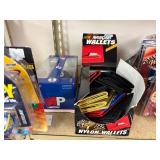 NASCAR lighters, cars, shirts, can coolers, blankets, flasks, desk set, hats, and license plates