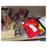 NASCAR lighters, cars, shirts, can coolers, blankets, flasks, desk set, hats, and license plates