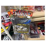 NASCAR lighters, cars, shirts, can coolers, blankets, flasks, desk set, hats, and license plates