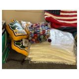 Football tchotchkes: flags, cups, blankets, key chains