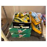 Football tchotchkes: flags, cups, blankets, key chains