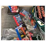 Football tchotchkes: flags, cups, blankets, key chains