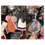 Winter hats. (4) Display racks included