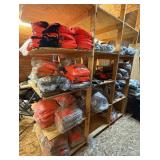 3 shelves of camo/orange hunting gear