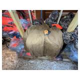 3 shelves of camo/orange hunting gear