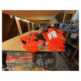 3 shelves of camo/orange hunting gear