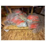 3 shelves of camo/orange hunting gear