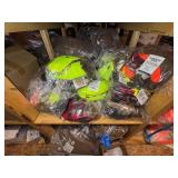 3 shelves of camo/orange hunting gear