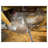 3 shelves of camo/orange hunting gear