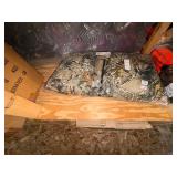 Hats, camo jackets, safety vests, bears in mugs, snow scrapers