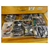 Sunglasses, shirts, chargers, lighters, playing cards, cases, task lights, umbrella, freeze-dried mini bursts