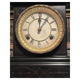 LL - Antique Black Mantel Clock with Ornate Metal Feet