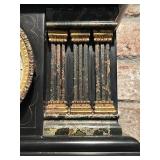 LL - Antique Black Mantel Clock with Ornate Metal Feet