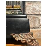 LL - Antique Black Mantel Clock with Ornate Metal Feet