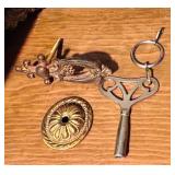 LL - Antique Black Mantel Clock with Ornate Metal Feet