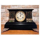 LL - Antique Black Mantel Clock with Ornate Metal Feet