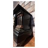 LL - Antique Black Mantel Clock with Ornate Metal Feet