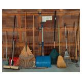 G - Collection of Lawn and Garden Tools Including Rakes, Shovels, and Brooms