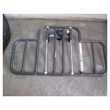 Metal framed safety side rail for a...