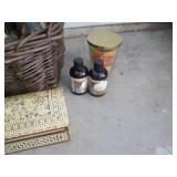 Large wicker basket containing a va...