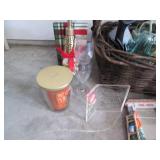 Large wicker basket containing a va...
