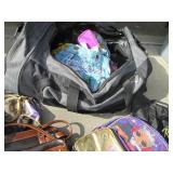 Massive rolling duffle bag full of ...