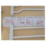 3 White Metal Baby / Pet Gates with instructions.