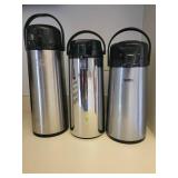 A set of 3 pump thermoses.