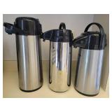 A set of 3 pump thermoses.