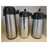 A set of 3 pump thermoses.