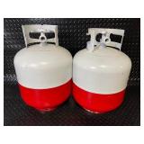 Pair of Red and White Propane Tanks