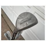 Vintage Golf Bag with Assorted Golf Clubs